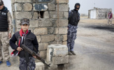 MOSUL, IRAK- MARCH, 2017: A littel girl is working at Mosul East checkpoint. (Picture by Veronique de Viguerie/ Reportage by Getty Images)