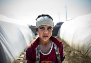 KHAZIR CAMP, IRAQ- MARCH, 2017: Sahad (11) is suffering from shrapnels wounds, he escaped Mosul with his family 20 days ago. (Picture by Veronique de Viguerie/Reportage by Getty Images).